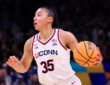 Azzi Fudd #35 of the UConn Huskies dribbles the ball during the NCAA Women's Final Four semifinal against South Carolina in Phoenix.