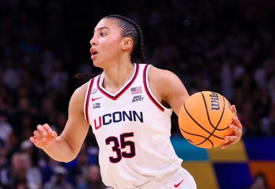 Azzi Fudd #35 of the UConn Huskies dribbles the ball during the NCAA Women's Final Four semifinal against South Carolina in Phoenix.