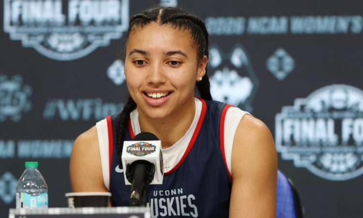 Azzi Fudd #35 of the UConn Huskies speaks at a press conference during the 2026 NCAA Women's Final Four in Phoenix.