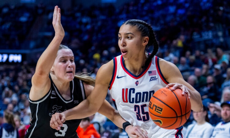 Azzi Fudd #35 of the UConn Huskies drives to the basket against Orlagh Gormley #3 of the Providence Friars during a game in Storrs.