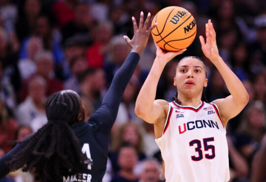 Azzi Fudd #35 of the UConn Huskies shoots a jumper against Ayla McDowell #24 of the South Carolina Gamecocks during the 2026 NCAA Final Four.
