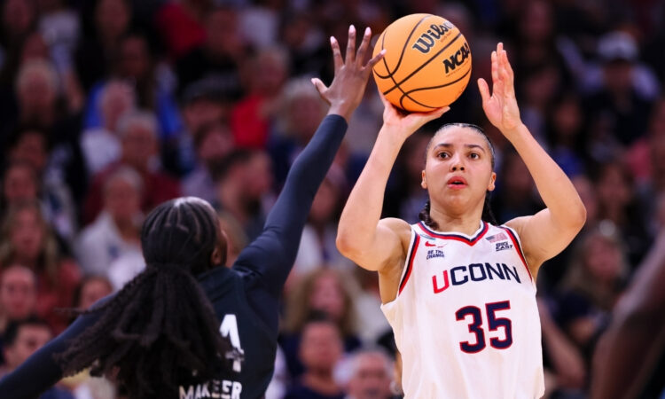Azzi Fudd #35 of the UConn Huskies shoots a jumper against Ayla McDowell #24 of the South Carolina Gamecocks during the 2026 NCAA Final Four.