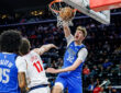Cooper Flagg #32 of the Dallas Mavericks throws down a slam dunk over Brook Lopez #11 of the Los Angeles Clippers at Intuit Dome.