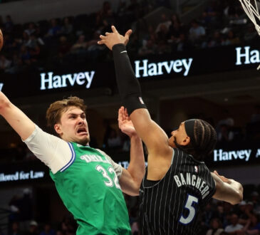 Cooper Flagg dunking on Paolo Banchero Dallas Mavericks vs Orlando Magic April 3 2026 American Airlines Center