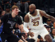 Cooper Flagg #32 of the Dallas Mavericks plays tight defense on LeBron James #23 of the Los Angeles Lakers during their April 5, 2026, game at American Airlines Center.