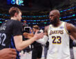 Cooper Flagg #32 of the Dallas Mavericks shakes hands with LeBron James #23 of the Los Angeles Lakers after a Mavericks win at American Airlines Center on April 5, 2026 in Dallas, Texas.