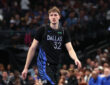 Cooper Flagg #32 of the Dallas Mavericks observes the action during the second quarter against the Minnesota Timberwolves at American Airlines Center.