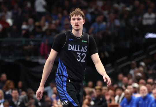 Cooper Flagg #32 of the Dallas Mavericks observes the action during the second quarter against the Minnesota Timberwolves at American Airlines Center.