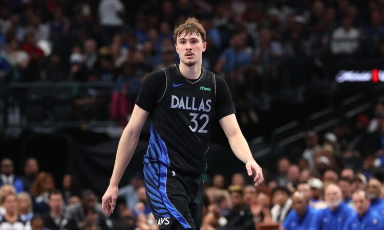 Cooper Flagg #32 of the Dallas Mavericks observes the action during the second quarter against the Minnesota Timberwolves at American Airlines Center.