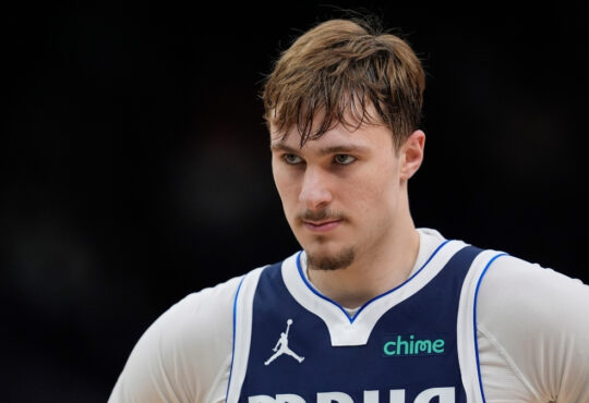 Cooper Flagg #32 of the Dallas Mavericks looks on during the fourth quarter of a game against the Milwaukee Bucks at Fiserv Forum.