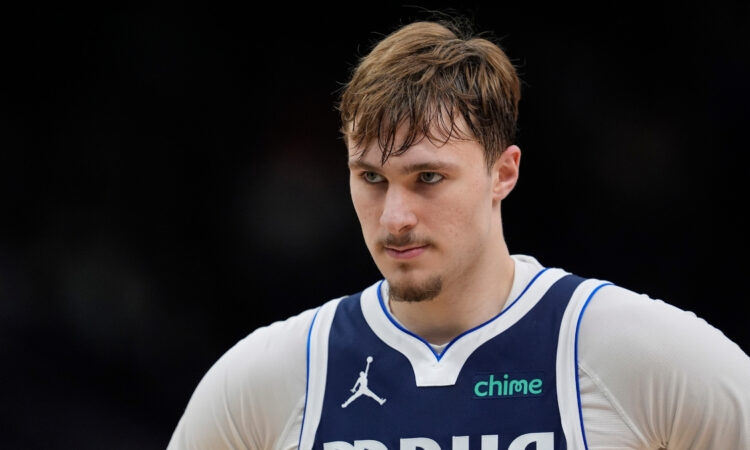 Cooper Flagg #32 of the Dallas Mavericks looks on during the fourth quarter of a game against the Milwaukee Bucks at Fiserv Forum.