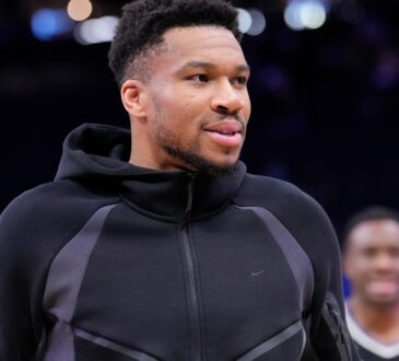 Giannis Antetokounmpo #34 of the Milwaukee Bucks walking off the court after a game against the Memphis Grizzlies at Fiserv Forum on April 05, 2026.