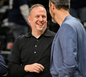 Josh Kroenke and Minnesota Timberwolves President of Basketball Operations Tim Connelly talk before Game 4 of the Western Conference Playoffs at Target Center on April 25, 2026.