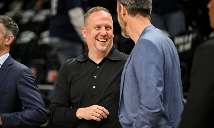 Josh Kroenke and Minnesota Timberwolves President of Basketball Operations Tim Connelly talk before Game 4 of the Western Conference Playoffs at Target Center on April 25, 2026.