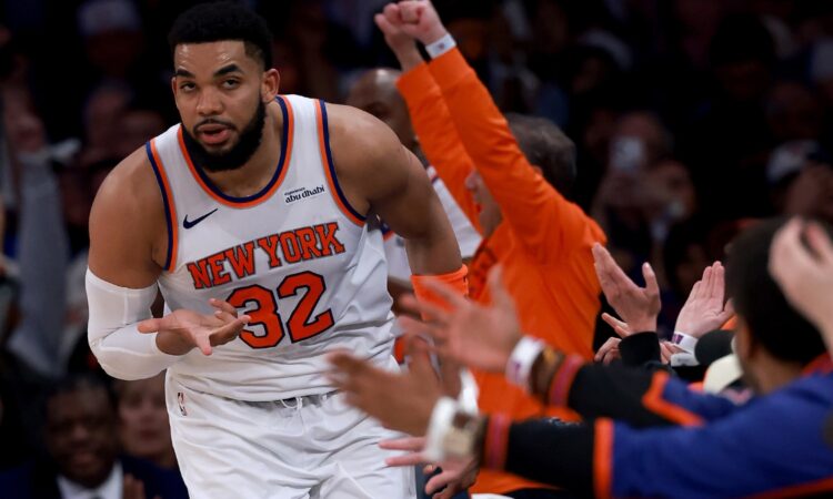 Karl-Anthony Towns #32 of the New York Knicks celebrates a three-pointer against the Atlanta Hawks in Game 1 of the Eastern Conference First Round at Madison Square Garden on April 18, 2026.