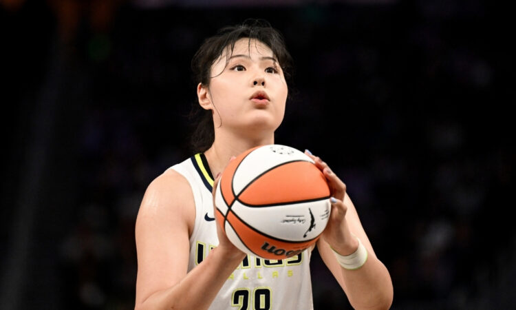 Li Yueru #28 of the Dallas Wings focuses during a free throw attempt against the Las Vegas Aces at College Park Center.