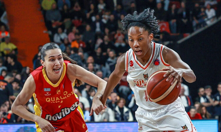 Lindsey Allen of CBK Mersin competes for the ball against Pinelopi Pavlopoulou during the EuroCup Women final in Turkiye.
