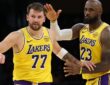 LeBron James congratulating Luka Dončić after his 51-point performance and record-breaking three-pointer during the Lakers vs. Bulls game at Crypto.com Arena.