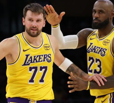 LeBron James congratulating Luka Dončić after his 51-point performance and record-breaking three-pointer during the Lakers vs. Bulls game at Crypto.com Arena.