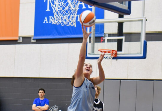 Dallas Wings forward Maddy Siegrist elevates for a layup during a training camp practice session at College Park Center.
