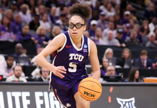 Olivia Miles #5 of the TCU Horned Frogs dribbles up the court during the Elite Eight round of the 2026 NCAA Women's Basketball Tournament in Sacramento.