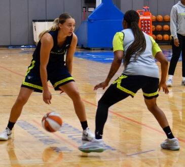 Dallas Wings star Paige Bueckers brings the ball up the floor and surveys the defense during a 5-on-5 scrimmage at College Park Center.