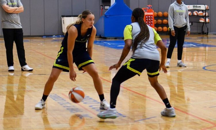 Dallas Wings star Paige Bueckers brings the ball up the floor and surveys the defense during a 5-on-5 scrimmage at College Park Center.