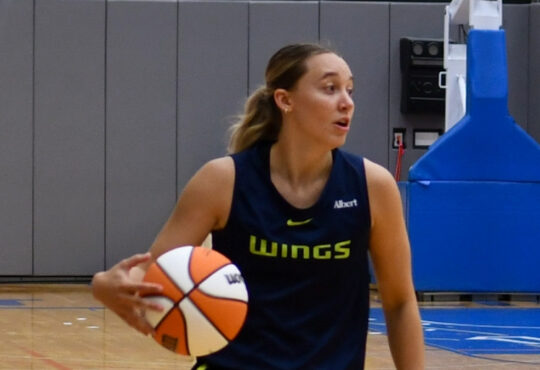Dallas Wings star Paige Bueckers dribbles the ball up the floor while surveying the defense during a 5-on-5 scrimmage at College Park Center.