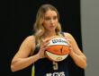 Dallas Wings guard Paige Bueckers poses with a basketball during the team’s 2026 Media Day at College Park Center.