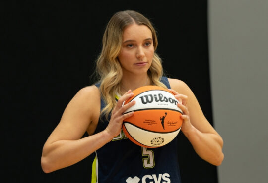 Dallas Wings guard Paige Bueckers poses with a basketball during the team’s 2026 Media Day at College Park Center.