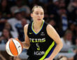 Dallas Wings guard Paige Bueckers handles the ball against the Minnesota Lynx at Target Center in Minneapolis.