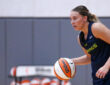 Dallas Wings guard Paige Bueckers dribbles during a training camp practice session at College Park Center in Arlington.