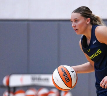 Dallas Wings guard Paige Bueckers dribbles during a training camp practice session at College Park Center in Arlington.