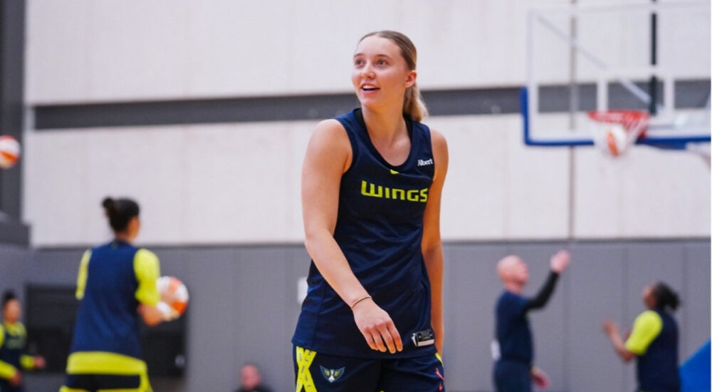 Dallas Wings guard Paige Bueckers handles the ball during a 2026 training camp practice session in Arlington.