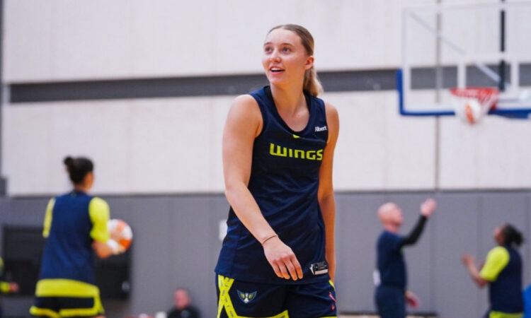 Dallas Wings guard Paige Bueckers handles the ball during a 2026 training camp practice session in Arlington.