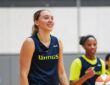 Dallas Wings guard Paige Bueckers handles the ball during a team drill on the opening day of 2026 training camp in Arlington.