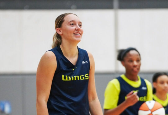 Dallas Wings guard Paige Bueckers handles the ball during a team drill on the opening day of 2026 training camp in Arlington.