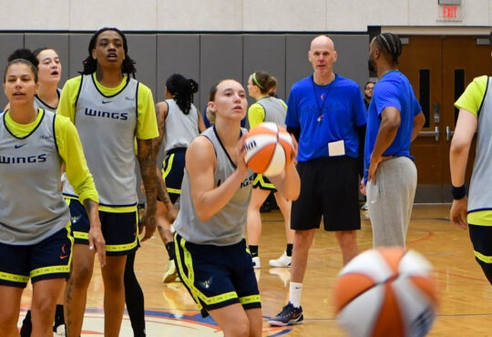 Dallas Wings guard Paige Bueckers taking a jump shot during a team shooting drill at a 2026 training camp practice in Arlington.