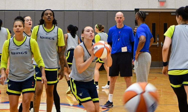 Dallas Wings guard Paige Bueckers taking a jump shot during a team shooting drill at a 2026 training camp practice in Arlington.