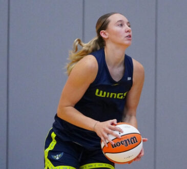 Dallas Wings guard Paige Bueckers squaring up to shoot a basketball during a 2026 training camp practice session in Arlington.