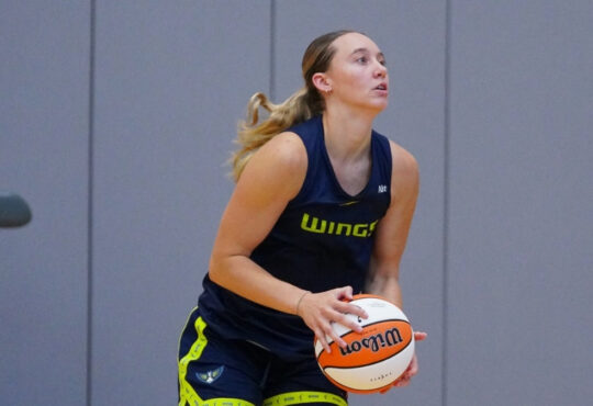 Dallas Wings guard Paige Bueckers squaring up to shoot a basketball during a 2026 training camp practice session in Arlington.
