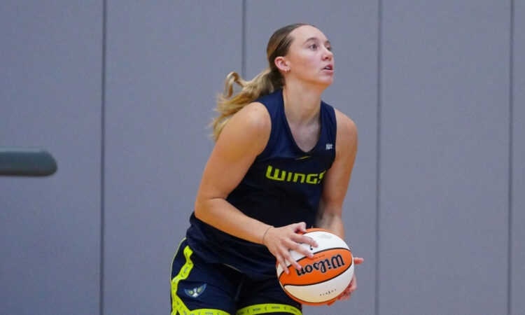 Dallas Wings guard Paige Bueckers squaring up to shoot a basketball during a 2026 training camp practice session in Arlington.