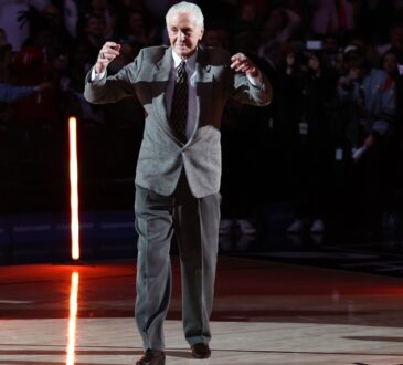 Miami Heat President Pat Riley gestures on the court during the 2006 NBA Finals 20th anniversary celebration at Kaseya Center on February 03, 2026.