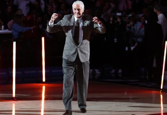 Miami Heat President Pat Riley gestures on the court during the 2006 NBA Finals 20th anniversary celebration at Kaseya Center on February 03, 2026.