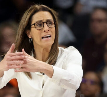 Indiana Fever head coach Stephanie White calls a timeout during the 2025 WNBA Playoffs against the Las Vegas Aces.
