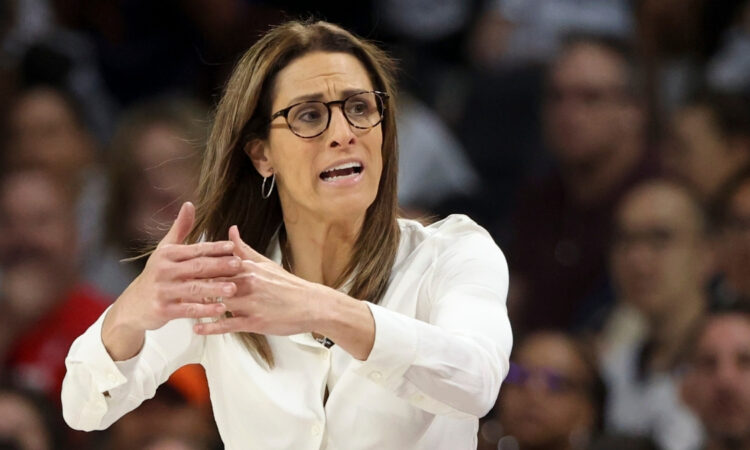 Indiana Fever head coach Stephanie White calls a timeout during the 2025 WNBA Playoffs against the Las Vegas Aces.