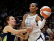 Alanna Smith of the Dallas Wings defending A'ja Wilson of the Las Vegas Aces during a preseason game.