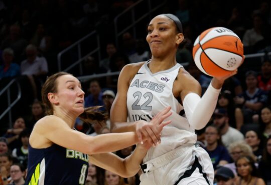 Alanna Smith of the Dallas Wings defending A'ja Wilson of the Las Vegas Aces during a preseason game.