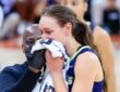 Alanna Smith of the Dallas Wings walks off the court with a facial injury during the preseason finale against the Las Vegas Aces in Austin.