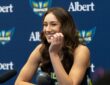 Alanna Smith of the Dallas Wings addressing reporters from the podium during the 2026 Media Day at College Park Center.